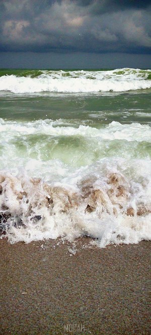 Stormy Sea Waves Crashing on Sandy Beach