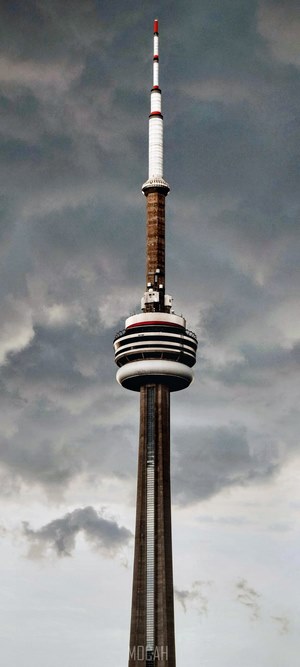 CN Tower in Toronto under cloudy sky