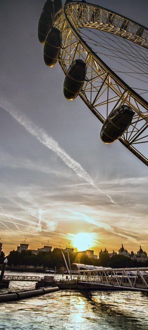 London Eye at sunset over the Thames