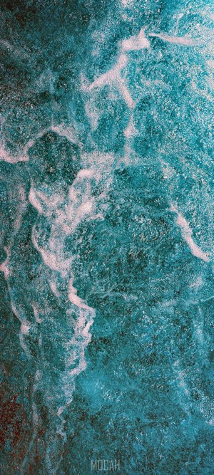 Abstract turquoise water texture with white foam