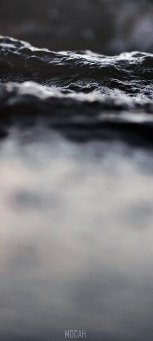 Abstract dark water surface with reflection