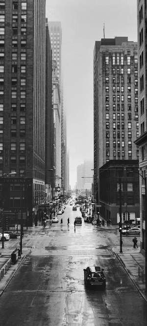 Black and white street view of Chicago on a rainy day