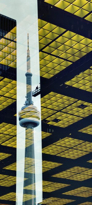 CN Tower reflection on glass and yellow building