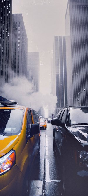 New York City street with yellow taxi and black SUV