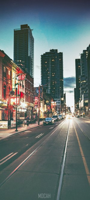 Street scene with Kit Kat sign and skyscrapers