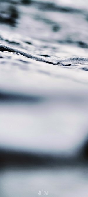 Abstract close-up of water surface with bokeh effect