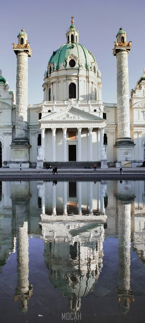 Karlskirche St. Charles Church reflected in water