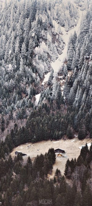 Snowy mountain landscape with cabins
