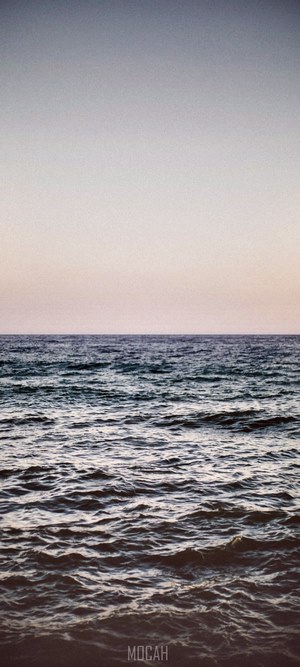Ocean waves at sunset
