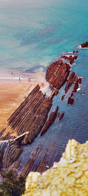 Unique rock formations leading to the ocean at Izturun