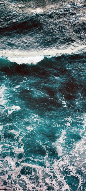 Ocean waves with white foam