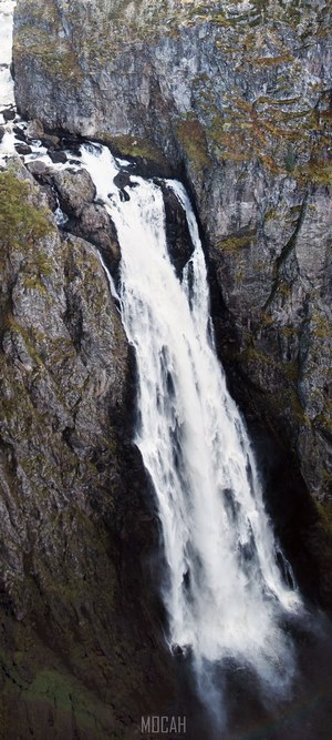 Waterfall cascading down a rocky cliff face