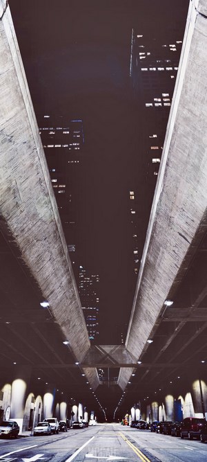 Los Angeles night cityscape under concrete infrastructure
