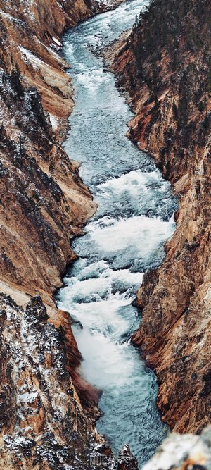 Wild River Flowing Through a Canyon