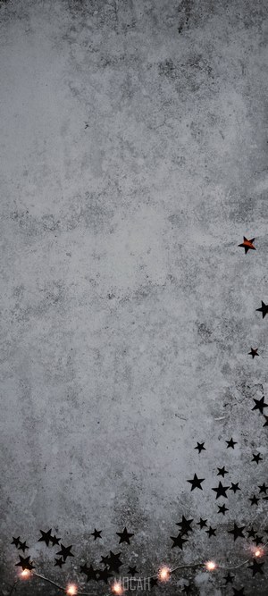 Stars and fairy lights on a textured background