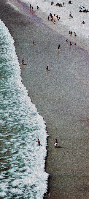 People on a beach with waves