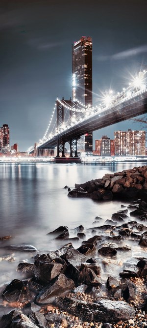 Manhattan Bridge at Night with Cityscape
