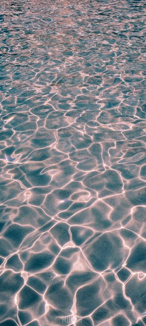 Water surface with light reflections