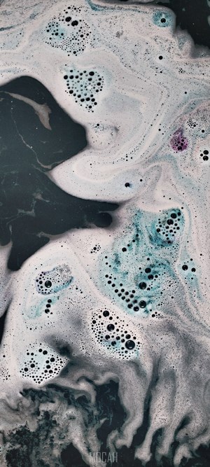 Abstract blue and white bubbles in liquid