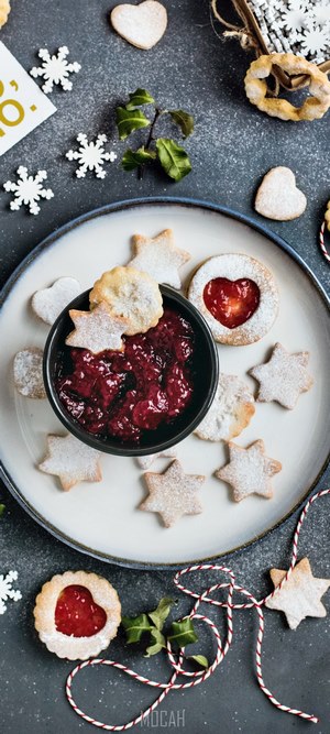 Handmade Christmas cookies with raspberry jam