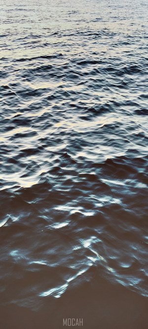 Water surface with light reflections