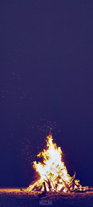 Bonfire at night with sparks