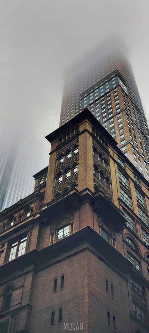 Brick building disappearing into fog in New York City