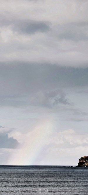 Ocean and Cliffs with Rainbow