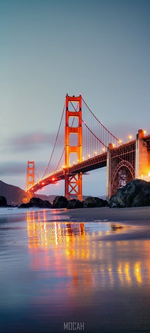 Golden Gate Bridge at dusk with reflections