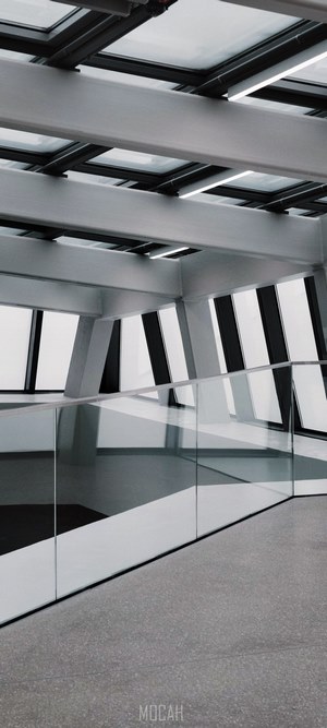 Modern Architecture Interior with Glass Railings and Skylights