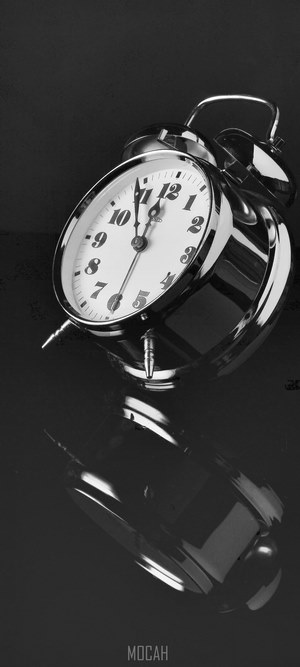 Alarm clock with reflection