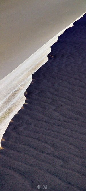Sand dune with dark sand and light sand