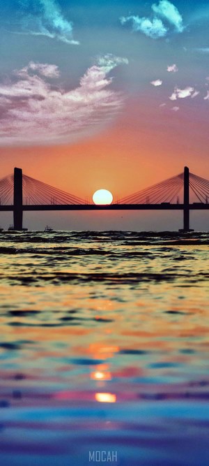 Bridge at sunset over the ocean