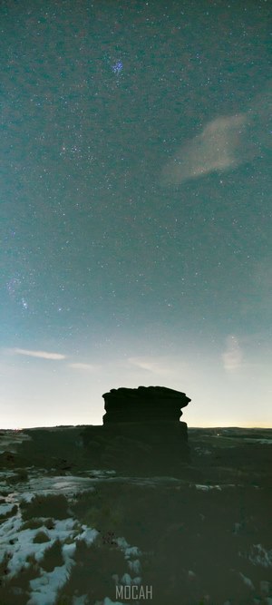 Rock formation under starry sky