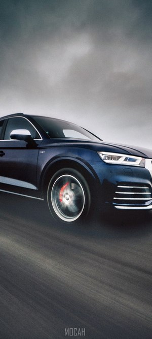 Dark Blue Audi Q5 Driving on a Road