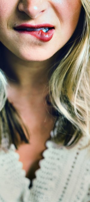Woman biting her lip