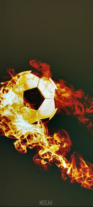 Flaming soccer ball on a dark background