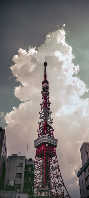 Tokyo Tower with clouds and buildings