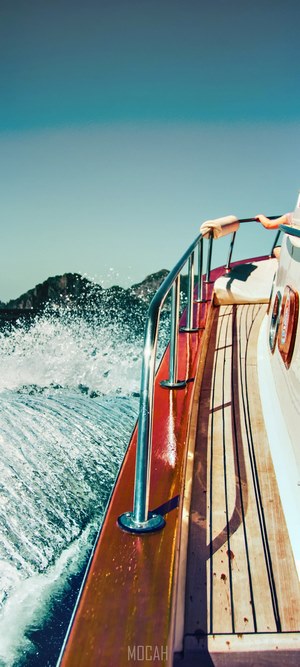 Boat ride with mountains and ocean spray