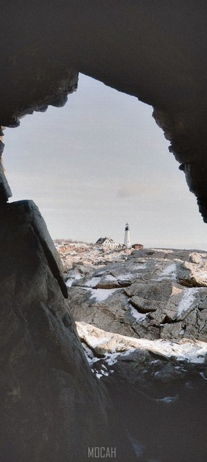 Portland Head Light Lighthouse through rock formation