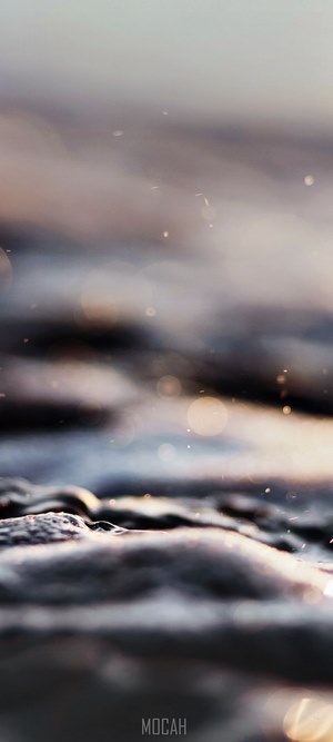 Macro photo of rippling water waves at Tahananui Beach