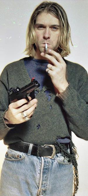 Kurt Cobain holding a gun and smoking