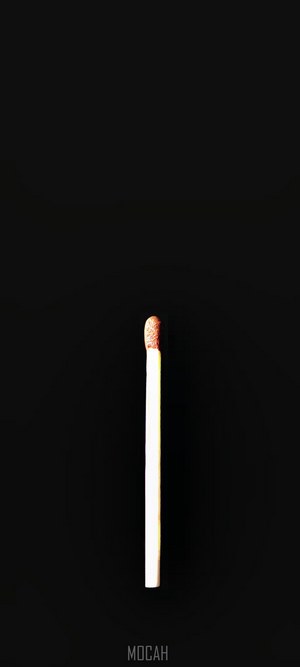 Matchstick on black background