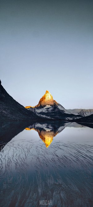 Sunrise Glow on Mountain Peak