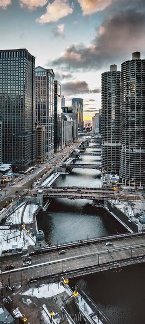 Chicago River with Urban Skyline at Sunset