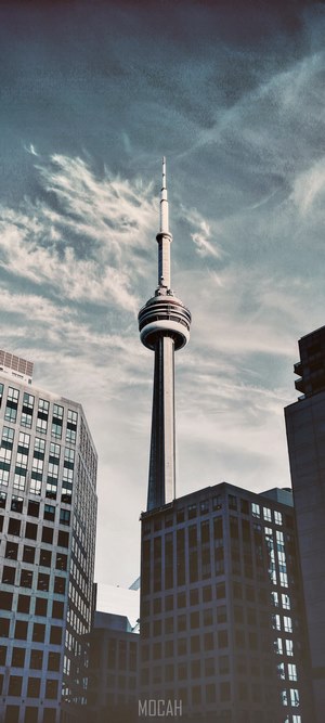 CN Tower and Toronto skyline under cloudy sky