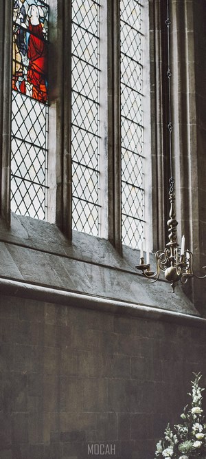 Wells Cathedral stained glass window and chandelier