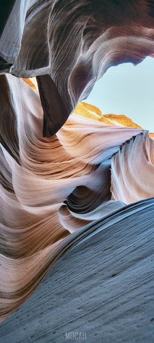 Antelope Canyon rock formations with orange and blue hues