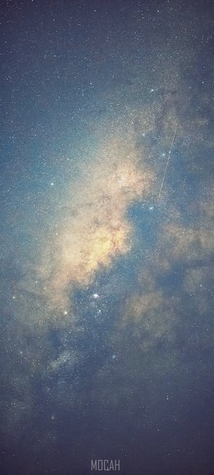 Milky Way galaxy with stars and a meteor