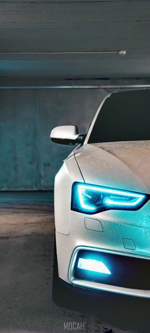 White Audi A5 with Blue LED Headlights in Garage